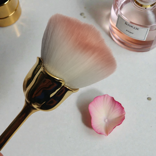 Brocha de maquillaje con estilo rosa